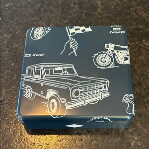 Fossil tin only new condition a vessel for a Bill Fold black NEEL dark grn & wht